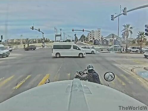 Motorcyclist stops short in front of trailer