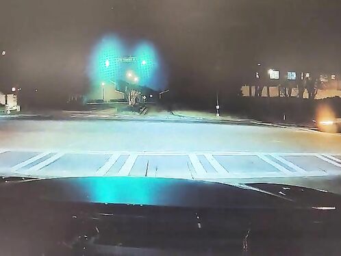 Driver loses control and spins out in heavy rain