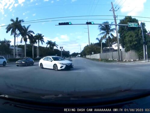 Car makes a wild left turn into traffic