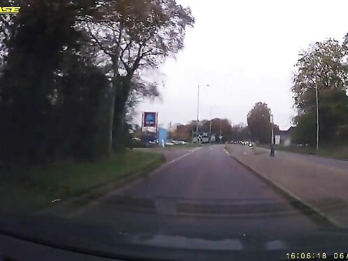 Driver avoids collision with speeding cyclist