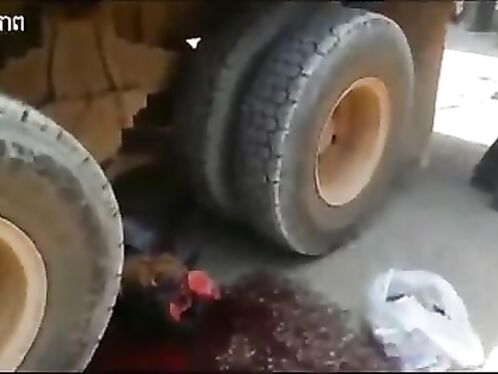 Woman's husband crushed by truck wheels