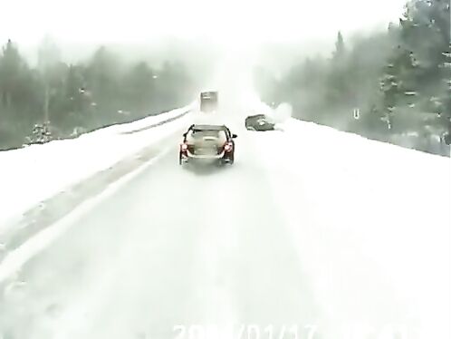 Truck driver catches huge snow drift and gets stuck