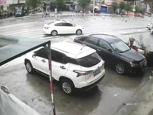 Car hits woman at crossing
