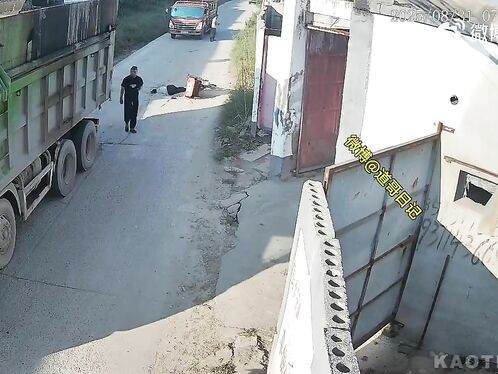 Man on motorbike gets run over by a truck