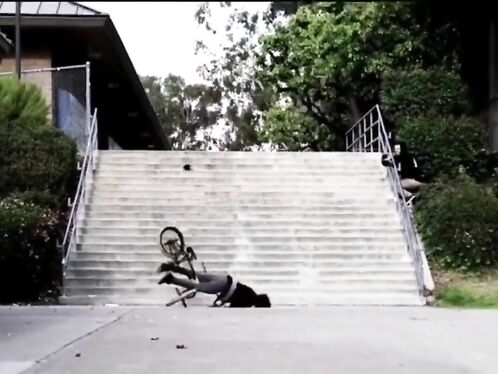 Skateboarder fails trick and crashes down steps