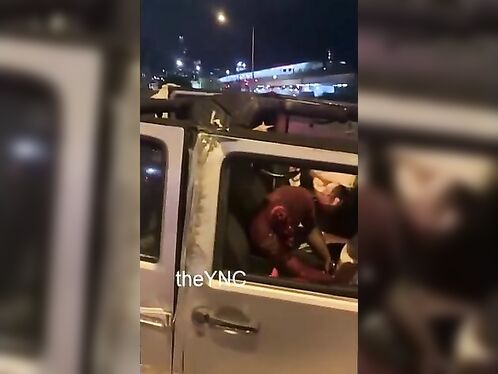 Driver breaks down in heavy rain on flooded highway