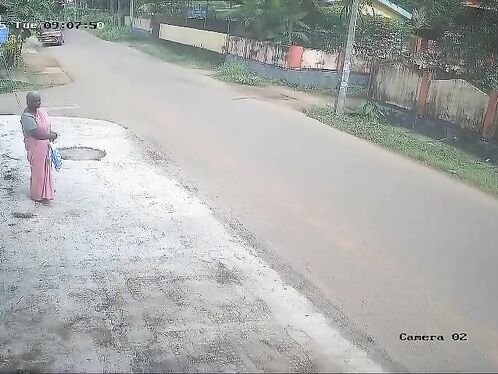 Car hits elderly woman at bus stop