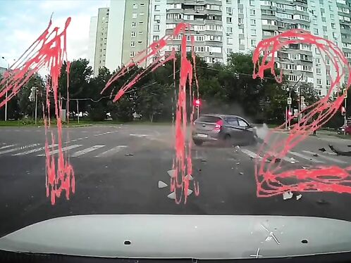Motorcyclist loses control and crashes at intersection