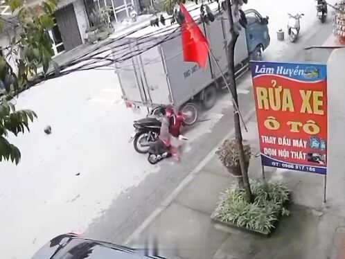 Motorcyclist crashes into hidden truck
