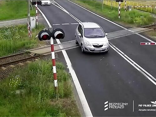 Driver hits train barriers and freezes