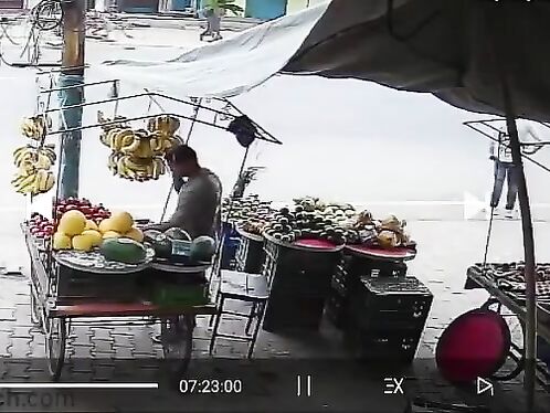 Man selling fruit gets shocked by truck's overhead wires