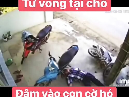 Men fight wildly with motorcycles in parking lot