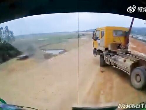 Man tries to escape flaming truck but falls off