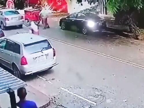 Pedicab rider crashes into moving car on busy street