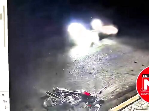Car hits motorcycle and keeps going.