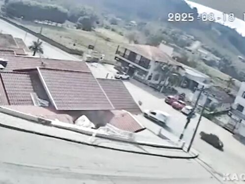 Van loses control and damages roof