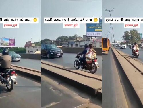Couple drives through heavy rain on a motorcycle