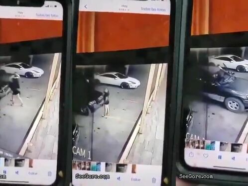 Woman is hit by a white sports car while crossing the street
