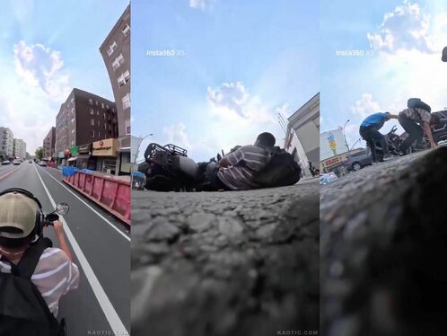 Man rides a motorcycle with a woman clinging to the tank