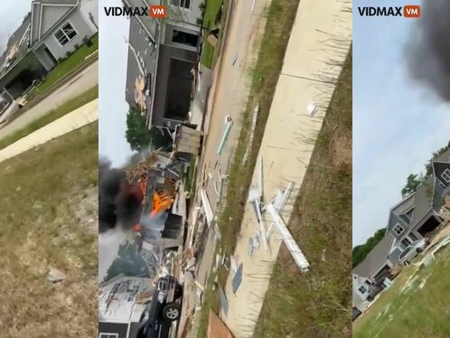 House explodes with inspector inside