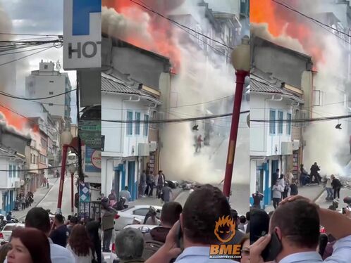 Firefighters battle blaze in narrow city alley
