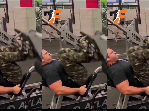 Man struggles with massive gym machine at the gym
