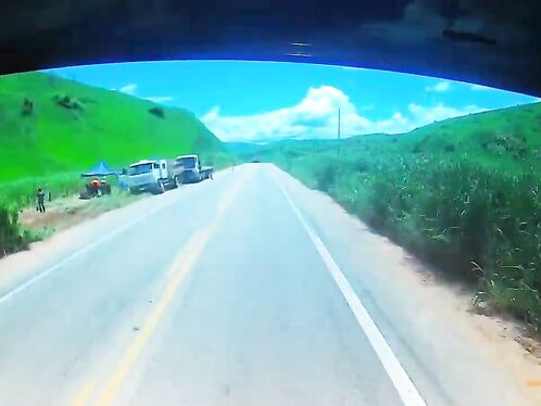 Car drifts towards oncoming traffic going uphill