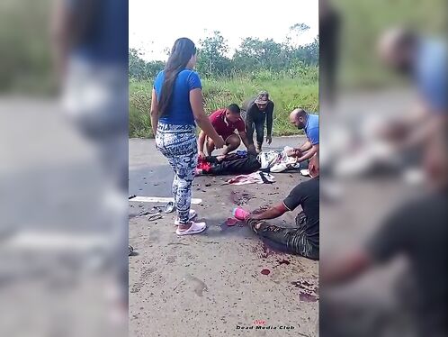 Woman steps on numerous pig heads spilling out of a truck