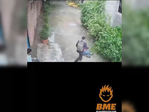Man slips and falls while carrying a big box