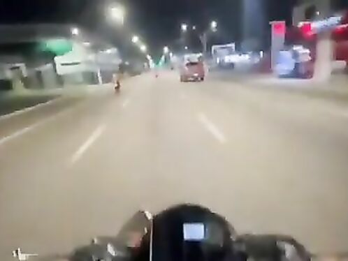 Motorcyclist rides through dangerously bright light