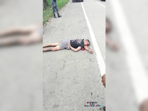 Man crashes motorcycle and throws himself down