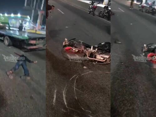 Biker crashes into parked truck