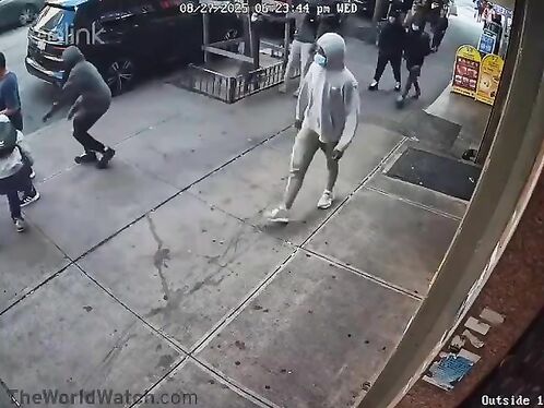 Man suddenly knocked down by stranger on busy sidewalk