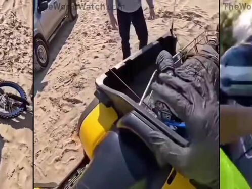 Rider flips ATV over in the sand