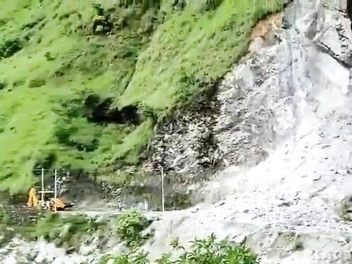 Massive boulder roll threatens construction workers