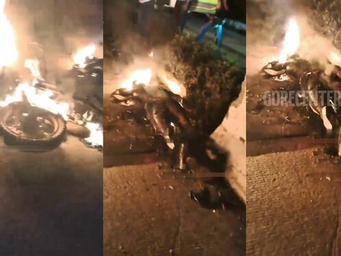 Car crashes into and explodes near the side of a road
