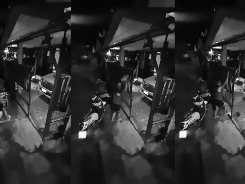 Woman rides scooter into her gate
