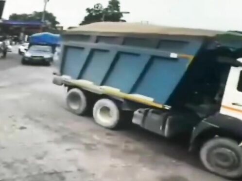 Truck hitch breaks off, dragging cable down busy street
