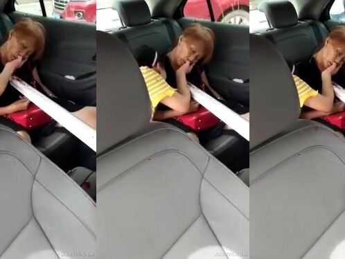 Woman covers her face in embarrassment after being caught