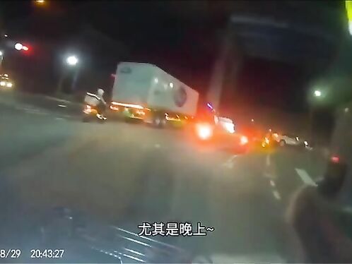 Truck drags a bunch of motorcycles at night