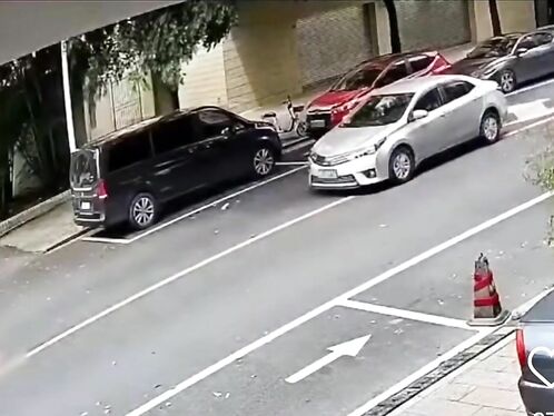 Car fails to navigate around cone and hits van