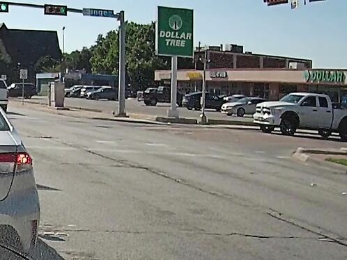 Car crashes into another car while entering the intersection