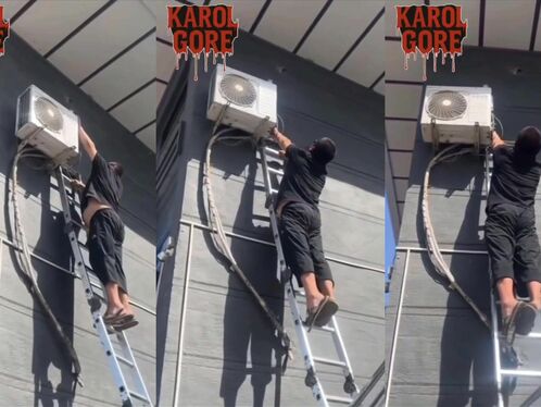 Man struggles to install air conditioner from a ladder