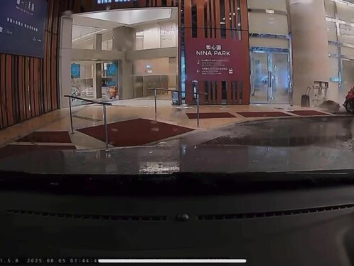 Car drifts into building after crashing into planter