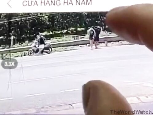 Couple crosses street with man