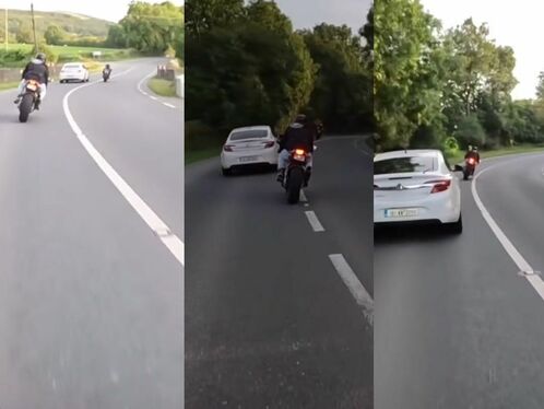Motorcyclist overtakes on the inside and almost causes a crash
