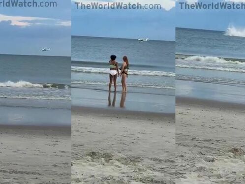 Two women on beach watch plane crash into ocean