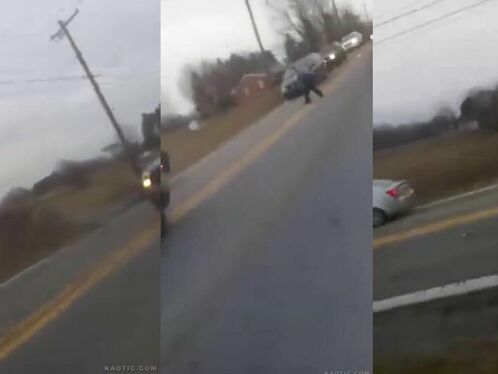 Motorcyclist swerves to avoid car crash on highway