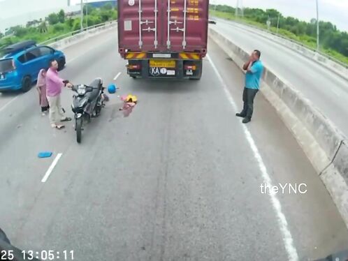Truck crushes wife in front of husband