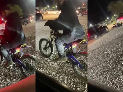 Rider loses balance and crashes on busy street